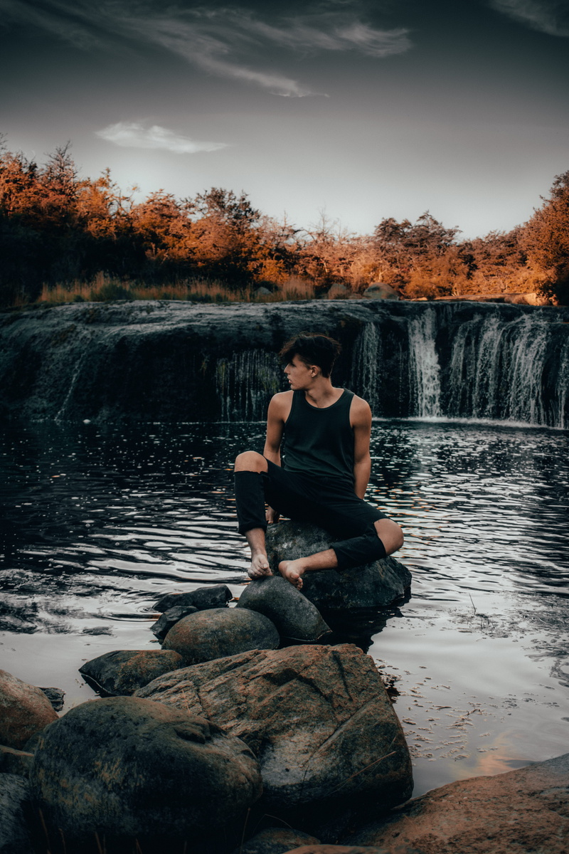 ripple, water, plant, full length, waterfall, river, teenager, lake, lifestyles, beauty in nature, casual clothing, apparel, tree, hairstyle, sea life
