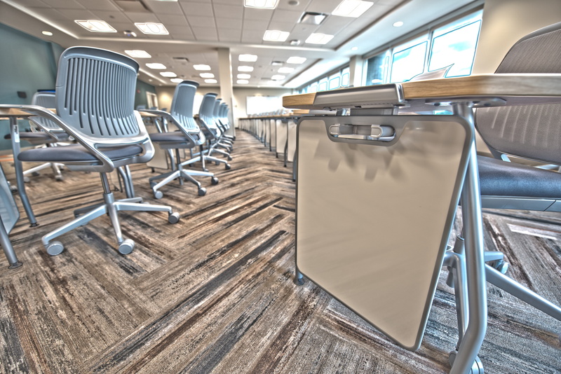 day, chair, rolling, flooring, close, no people, vehicle seat, in a row, architecture, classroom, public transportation, chairs, vehicle interior, row