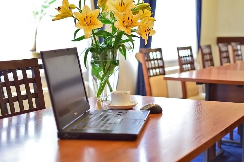 business services, indoors, table presentation, lecture, vase, wireless technology, black, notebook and coffee break in the meeting, plant, meeting, nature