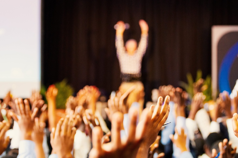 arms raised, applauding, performance, success, stage, event, spectator, crowd, conference, large group of people, rock music, audience, human arm, student