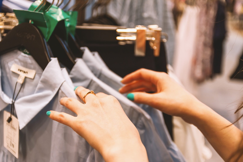 customer, boutique, tailor, fashion, woman, store, women, one person, clothing store, buying, chooses, consumerism, human hand, selective focus, clothes