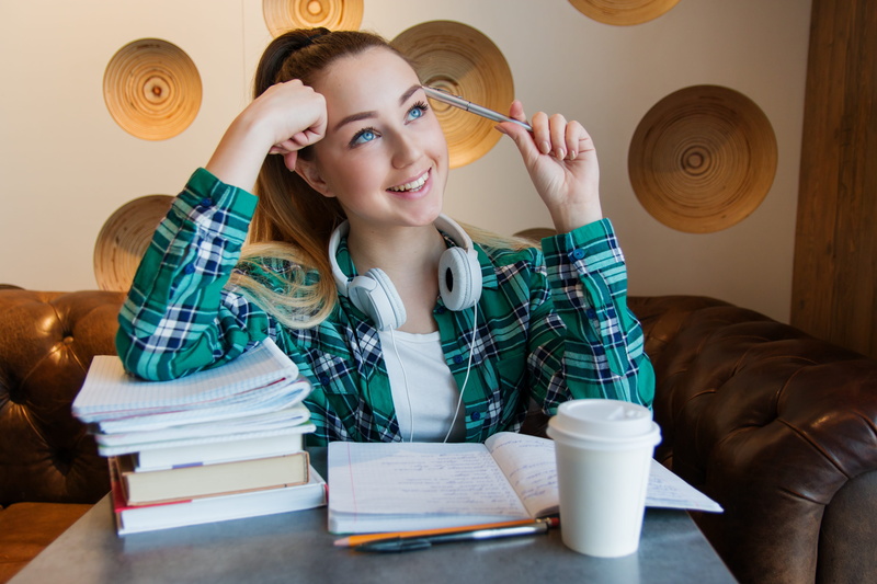 to solve, teen, college, 4K, studying, headsets, beautiful woman, sitting, student, pen, school, young women, notebook, women, young adult, book, domestic life