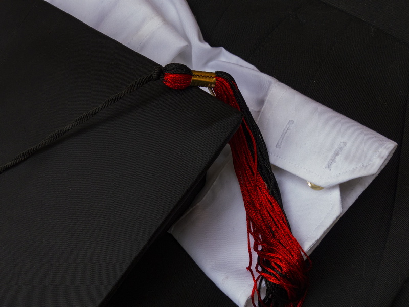 high angle view, textile, white color, still life, cap, necktie, education, symbol, degree, fashion, midsection, graduation tassel, hat, grad, no people