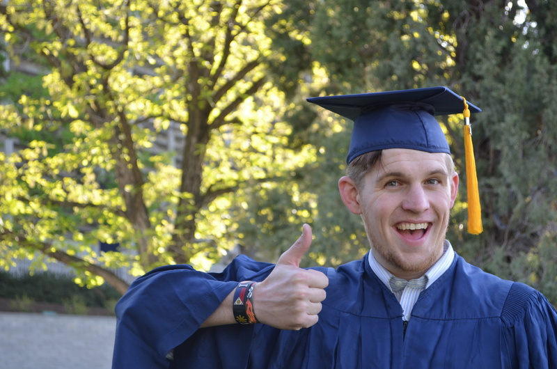 4K, showing, one person, learning, happy, positive emotion, education, front view, graduation gown, college, thumbs, young, men, gown, university, outdoors