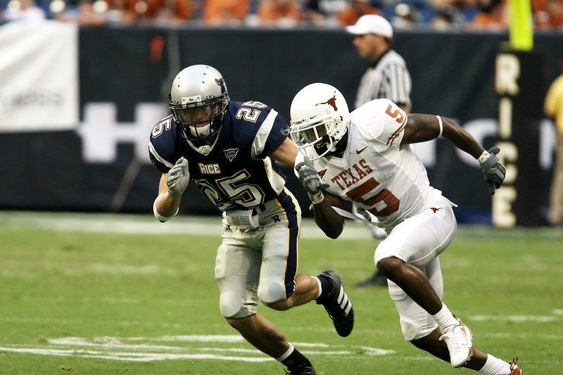 sport, male, texan, american football field, sports event, competitive, american football - ball, pigskin, security, two people, american football, sports team