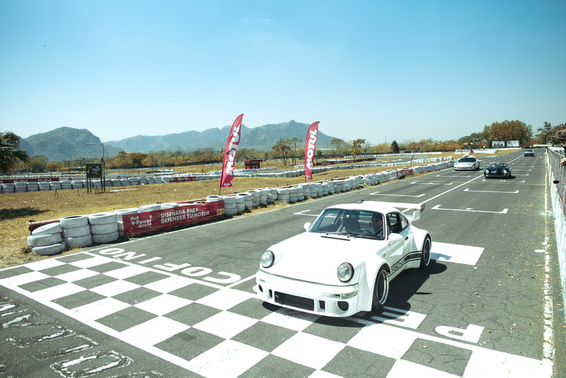 sky, car, symbol, land vehicle, racing, marking, summer, motor vehicle, nature, guatemala, sport, transportation, outdoors, sunlight, track, race, porche