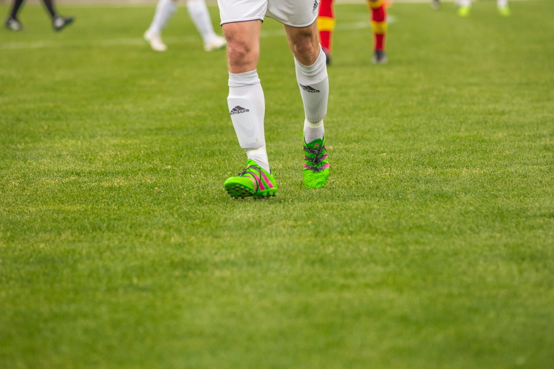 dress, plant, footballs, ball sports, outdoors, low section, sports clothing, human leg, duel, football pitch, day, soccer player, athlete, sport, nike