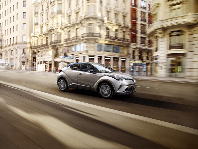 street, crossover, luxury, architecture, 2K, road, travel, Toyota C-HR, land vehicle, on the move, city street, transportation, city, blurred motion, outdoors