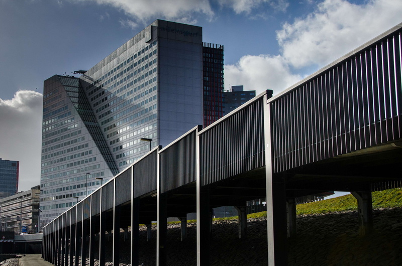 corporate, office building exterior, reflection, play of lines, business, public domain, low angle view, outdoors, metal, no people, glass - material, blue