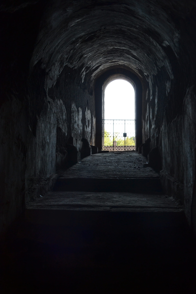 worrying, arched, old door, window, stone wall, direction, old, history, no people, empty, building, tunnel, solid, architecture, built structure, light