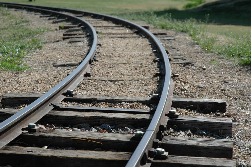 metal, no people, connection, railroad tie, curve, gravel, public transportation, track, outdoors, long, sunlight, rail transportation, railroad track