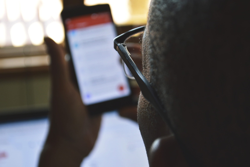 african American, over the shoulder view, mobile phone, black Person, phone, one person, 2K, tech, activity, holding, technology, lifestyles, email, black People