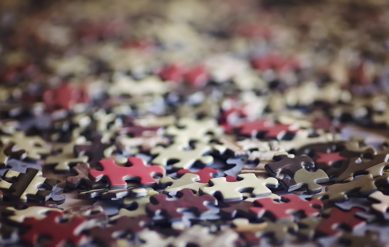 connection, close-up, puzzle, table, indoors, design, multi colored, jigsaw piece, selective focus, still life, full frame, puzzles, leisure games, abundance