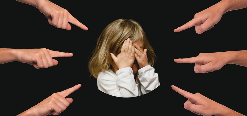 exclusion, fear, studio shot, people, psyche, emotion, suppression, debt, sad, blame, finger, offspring, teenager, men, hand, black background, the identified patient