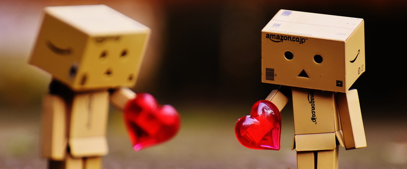 love, fun, technology, group of objects, indoors, three objects, no people, separated, toy, multi colored, funny cute, red, wood - material, danbo, box - container