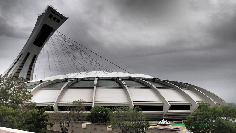 building, separated by comma lichtmast, industry, montreal, olympic stadium, sky, outdoors, government, 4K, no people, modern, sport, cloud - sky, building exterior