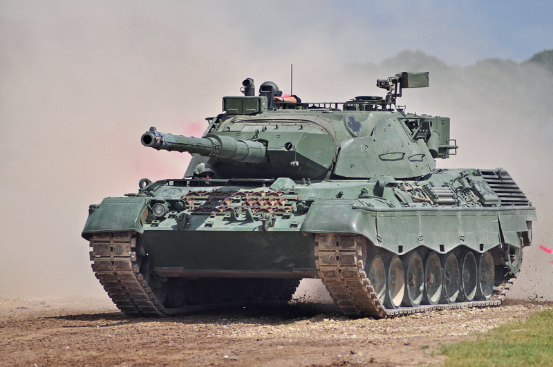 tank, single object, outdoors, transportation, Leopard-C2, army, fighting, mode of transportation, personnel, aggression, war, weapon, land, government