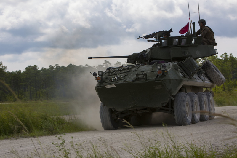 mode of transportation, armored personnel carrier, transportation, army, armed forces, uniform, outdoors, tank, armored tank, armored vehicle, day, land vehicle