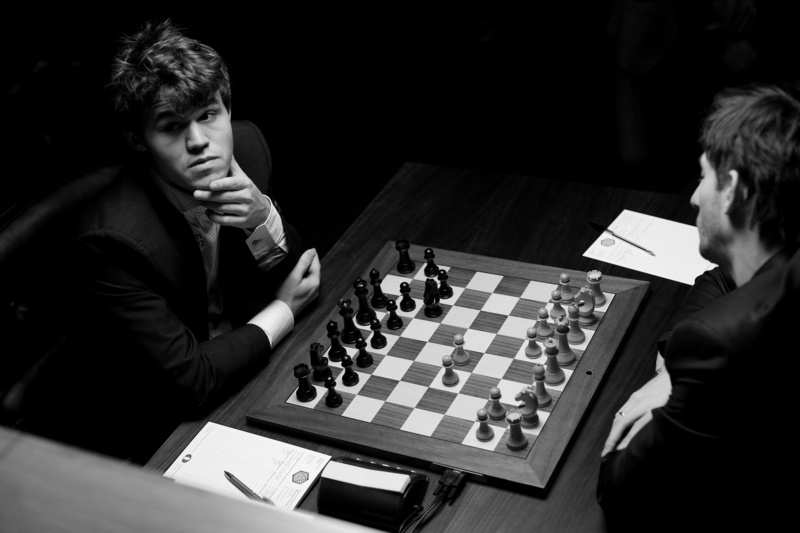 playing, game, board game, chess piece, sitting, chess board, strategy, table, 2K, Magnus Carlsen, men, indoors, chess, people, leisure activity, arts culture and entertainment