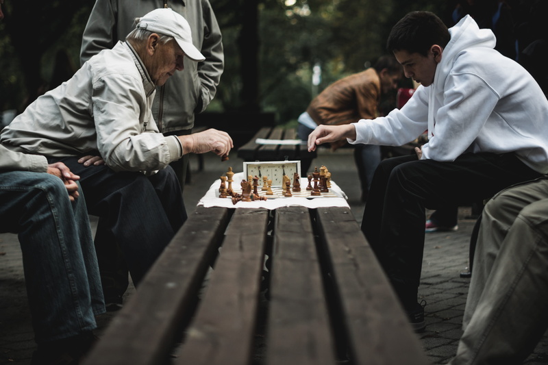 lifestyles, togetherness, 5K, day, table, playing, board game, real people, three quarter length, selective focus, men, chef, leisure activity, leisure games