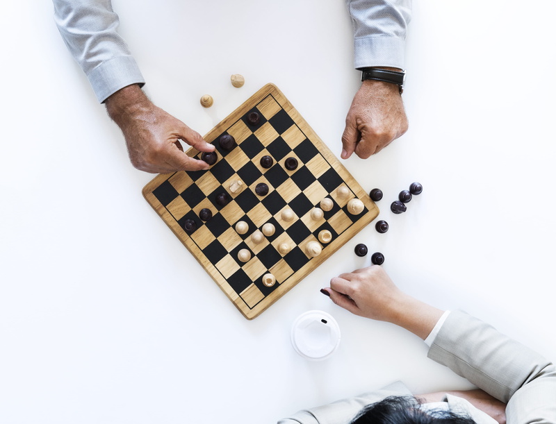 tactic, fun, board, leisure games, directly above, relaxation, high angle view, human hand, solution, studio shot, playing, hands, leisure, hand, intelligence