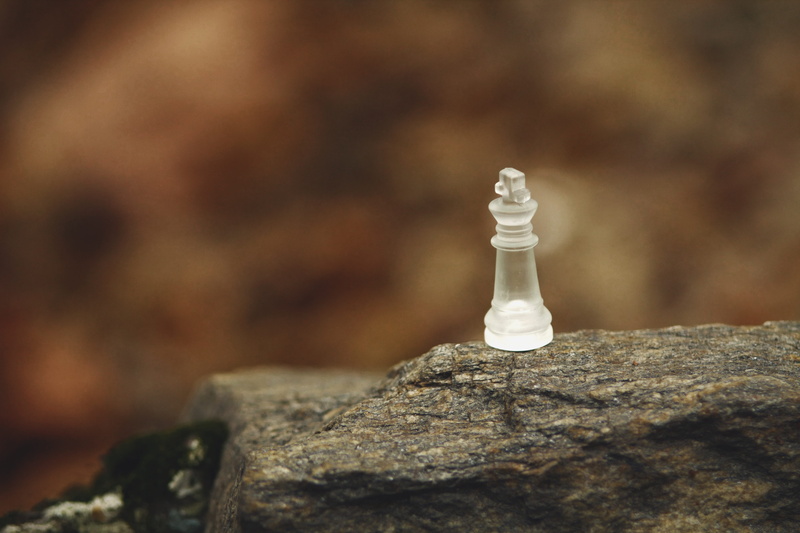 small, solid, no people, stone - object, game, piece, pawn - chess piece, chess pieces, glass, close-up, wood - material, textured, bishop, single object