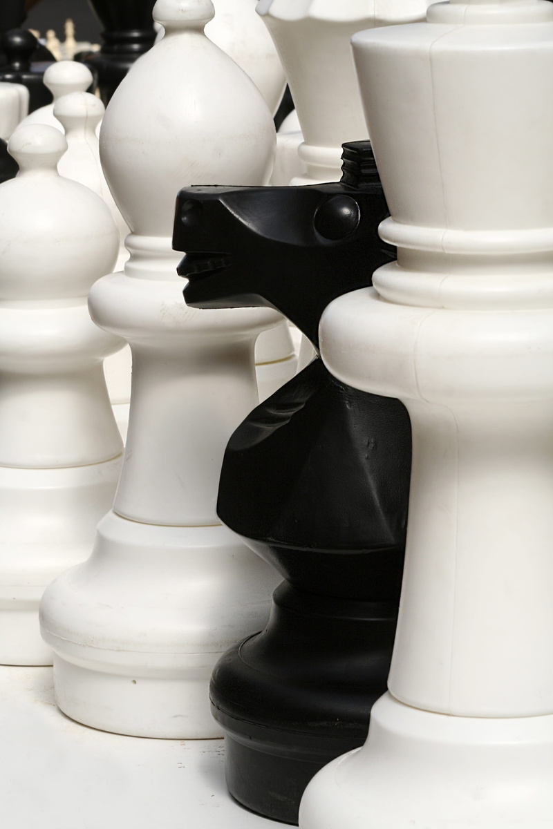 bishop, art and craft, chessboard, planning, leisure activity, black, white color, no people, leisure games, craft, thinking, indoors, chess board, battle