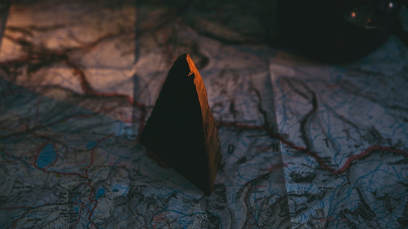 paper, shadow, brown, stone, outdoors, pencil, close-up, high angle view, plant, nature, no people, focus on foreground, creativity, map, glowing, wood - material