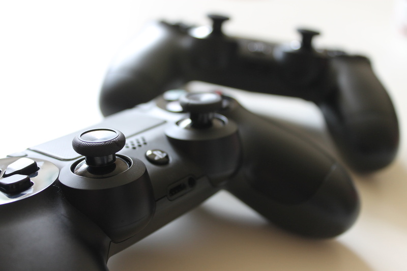 music, black, leisure activity, aggression, retro styled, single object, dualshock, equipment, selective focus, black color, close-up, communication, two
