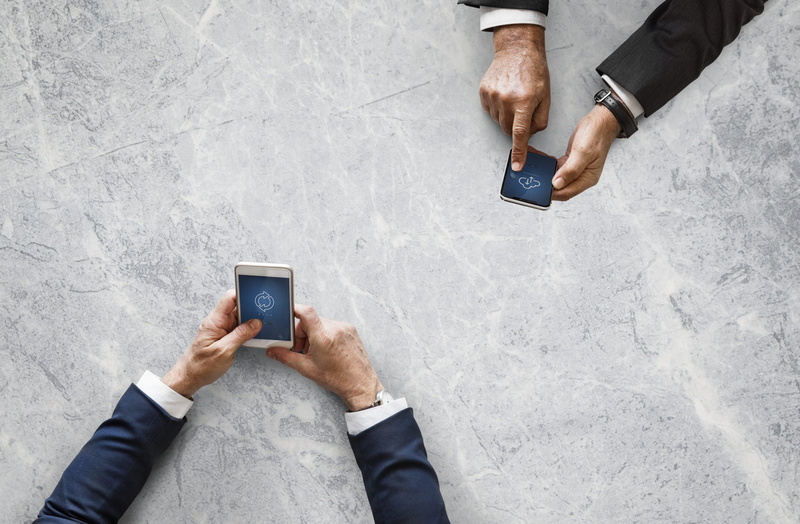 wireless, men, modern, portable information device, 1080P, directly above, two, human body part, table, businessman, people, mobile phone, arm, zimbabwe