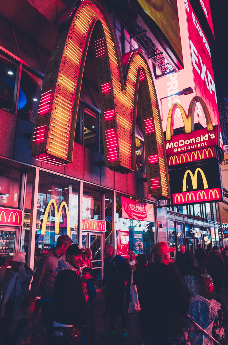 real people, group of people, neon, united states, lights, building exterior, night, adult, architecture, city, illuminated, communication, mcdonalds, women