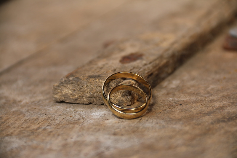 rings, day, event, love, gold, two, table, geometric shape, positive emotion, old-fashioned, composite, metal, jewelry, wood, indoors, gold rings, silver colored