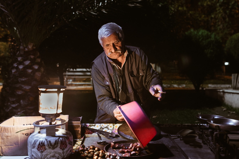 drink, real people, refreshment, labor, chestnut, work, preparing food, brown, food, sunday, old, trades, outdoors, dealer, adult, sell chestnuts, composition