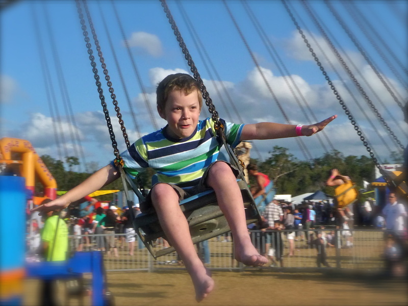 young, child, movement, daytime, flight, smiling, emotion, happiness, women, real people, outdoors, flying, joy, positive emotion, happy, amusement park ride