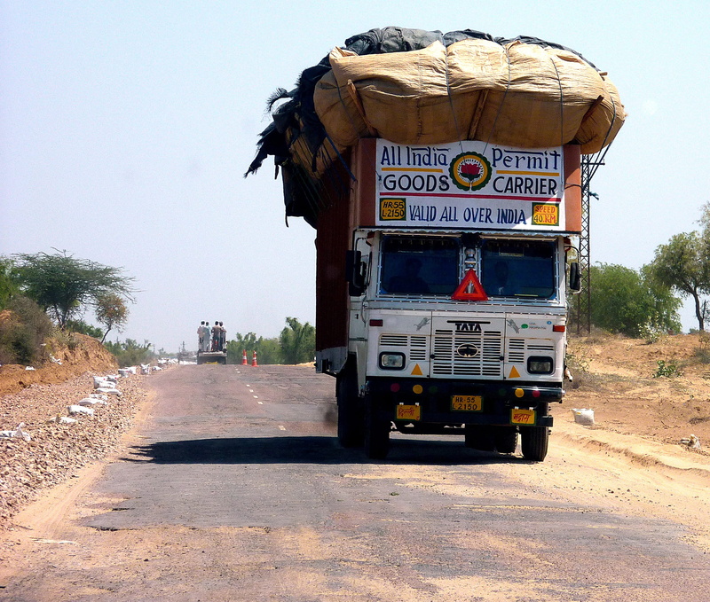 white, india, vice, plant, outdoors, text, transportation, motor vehicle, delivery, overloaded, day, tree, transport, land vehicle, cars, the way forward