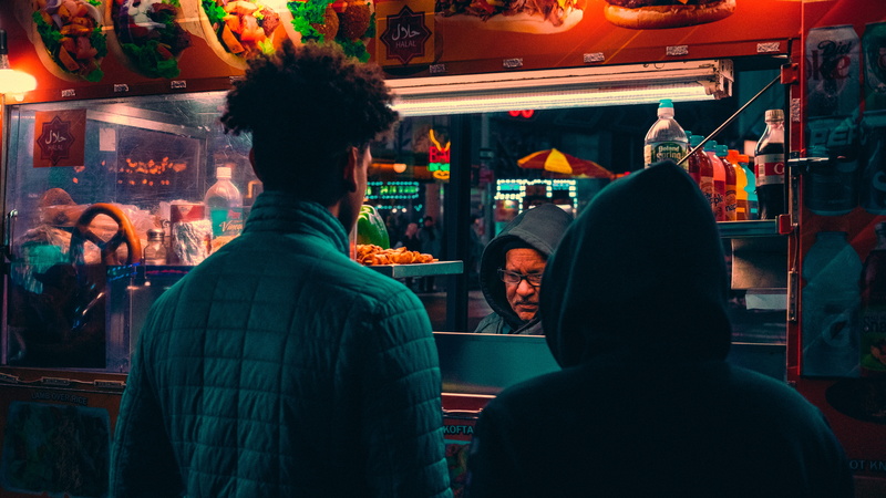 business, incidental people, men, consumerism, city, rear view, real people, leisure activity, market, illuminated, lifestyles, store, front, 5K, two
