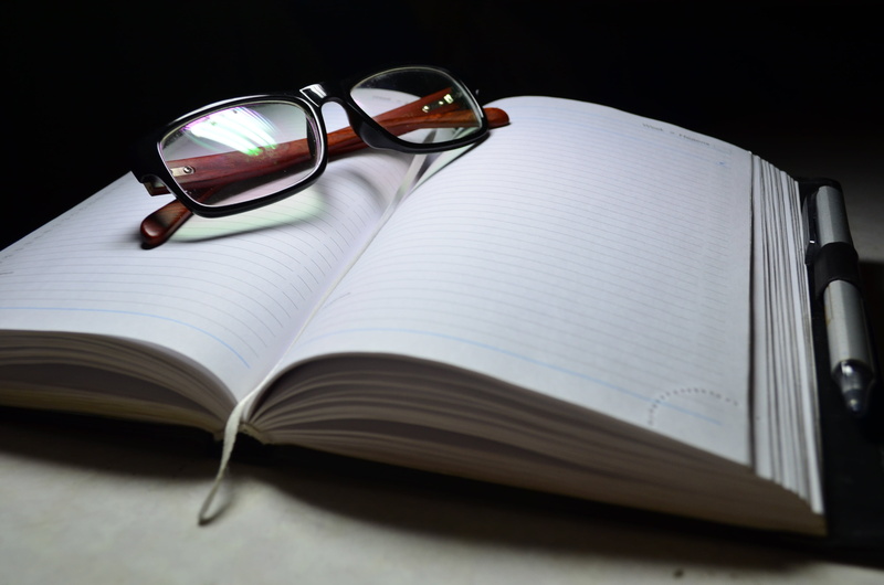 pen, page, paper, learning, negotiations, sunglasses, wood, work, open, businessman, notebook, education, personal accessory, note pad, eyeglasses, black background