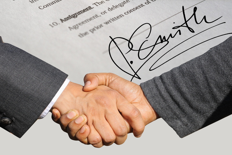 partnership, communication, shaking hands, human, business person, business, close-up, text, studio shot, agreement, contract, men, human body part, paper