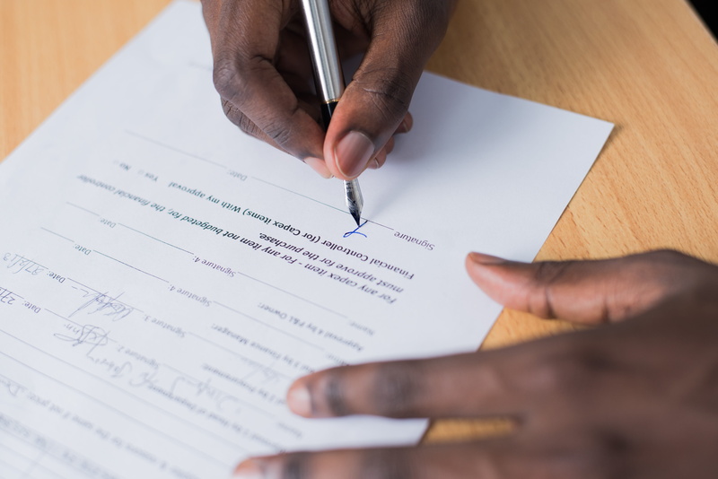 office, hand, document, business, focus, paperwork, agreement, human body part, men, pen, table, writing, one person, hands, males, indoors, signature