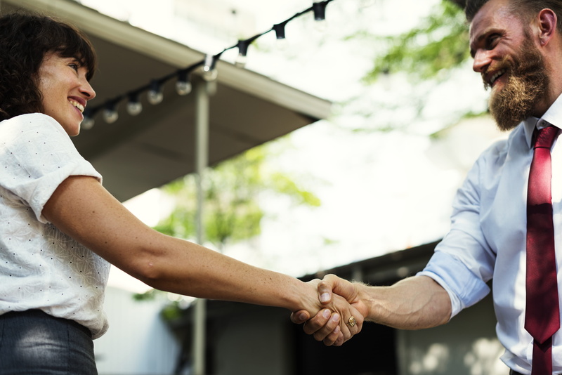 architecture, business person, two people, cheerful, man, smiling, men, smile, woman, daytime, focus on foreground, agreement, meeting, outdoors, emotion