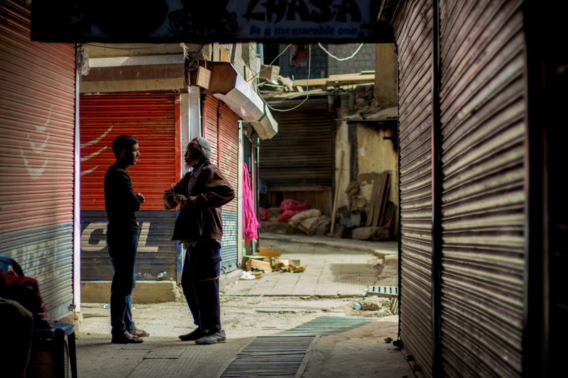 people, lifestyles, adult, person, walking, garbage, shady, real people, architecture, casual clothing, men, deal, leisure activity, rear view, positive emotion