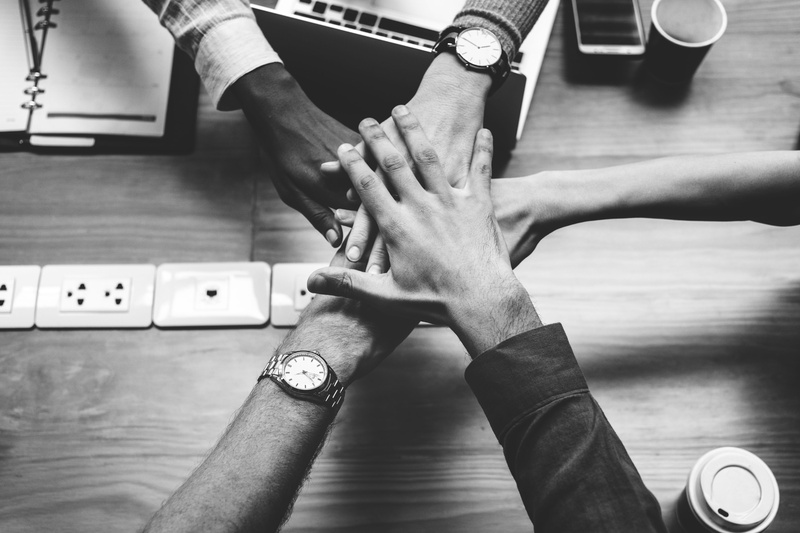 holding, two people, people, colleague, body part, adult, women, human leg, hand, sitting, achievement, human hand, indoors, leisure activity, real people
