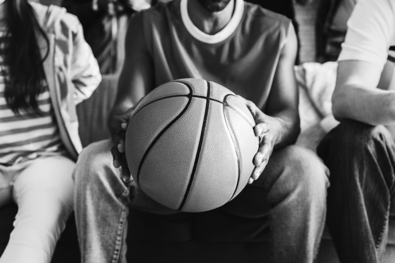 clothing, black-and-white, indoors, leisure, game, people, recreation, group of people, friendship, team, close-up, basketball - ball, sitting, person