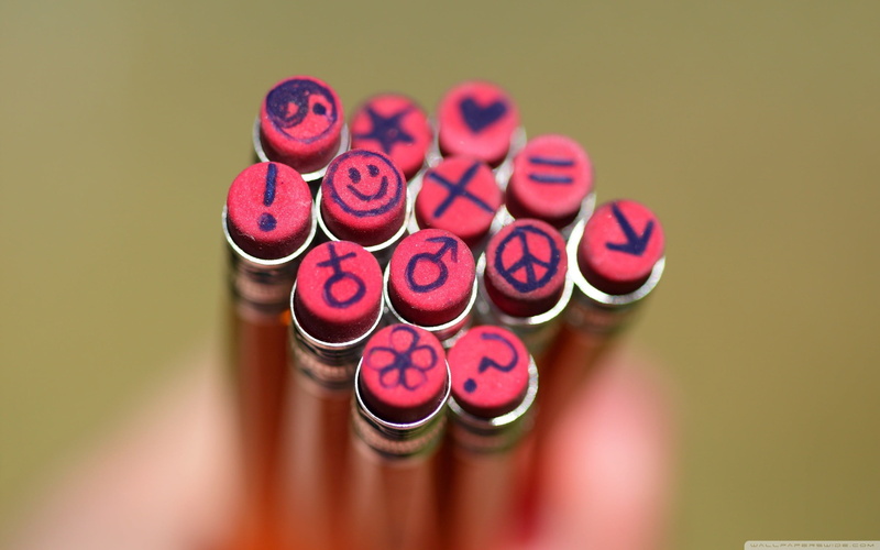 in a row, indoors, order, high angle view, text, lot, studio shot, eraser, table, 2K, pencils, pink color, writing instrument, wood - material, communication