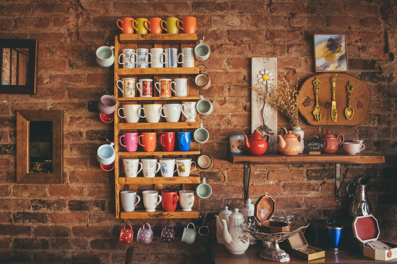 large group of objects, brickwall, no people, variation, shelf, stock, interior decoration, arrangement, assorted, colorful, food and drink, wood - material