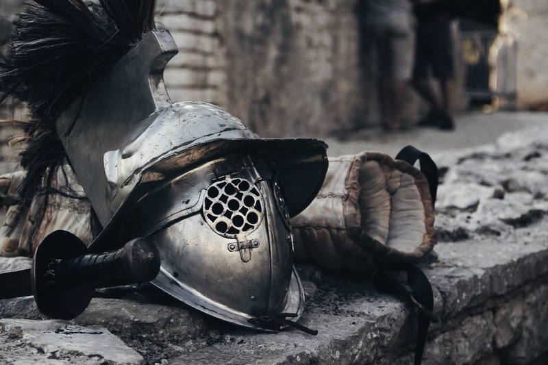 shoe, sunlight, sword, city, helmet, gear, close-up, army, soldier, silver, beside, old, street, arts culture and entertainment, outdoors, fight, day, shield