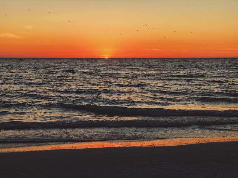 sea, non-urban scene, idyllic, cloud - sky, nature, florida, beach, beauty in nature, horizon, orange color, ocean, no people, united states, tranquil scene