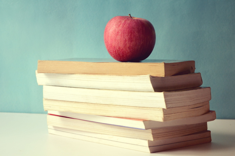 apple - fruit, learning, books, book, wood - material, food and drink, fruit, healthy eating, food, publication, table, read, concepts, red, wellbeing