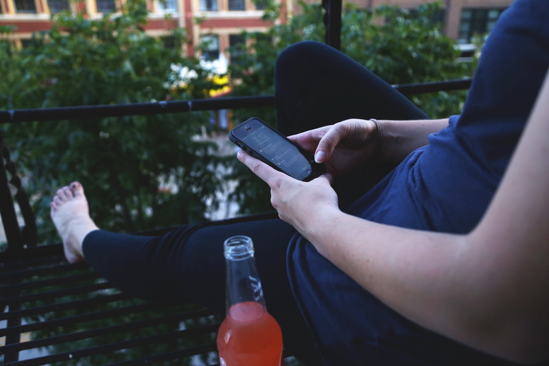 hand, smart phone, holding, black, network, message, gadget, mobility, glass, 5K, multimedia, bottle, business, beside, outdoors, pda, human body part