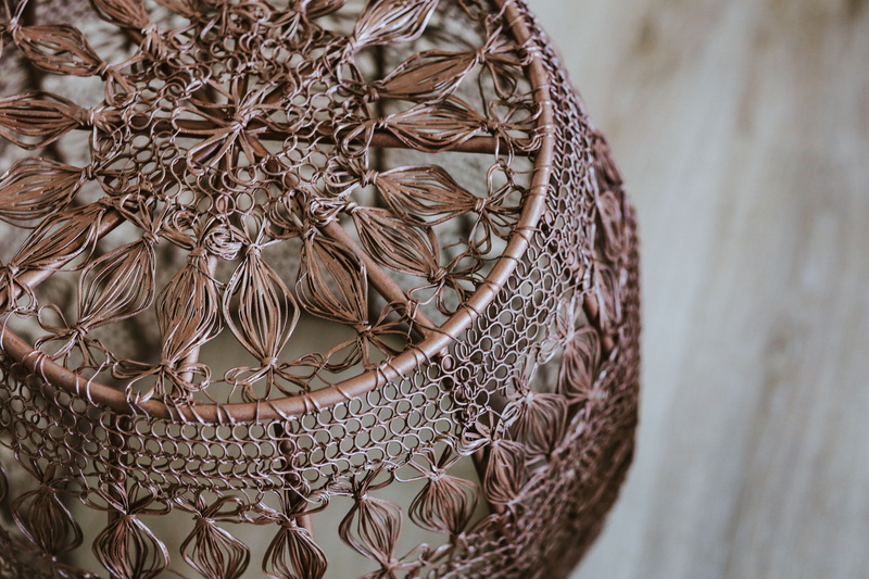 personal accessory, wood - Material, side table, decoration, high angle view, coffee table, floral pattern, art and craft, ornate, shape, craft, smartphone